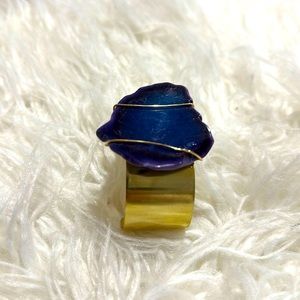 Hand made gold cuff bracelet with purple natural stone.